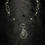 exuvia necklace.
